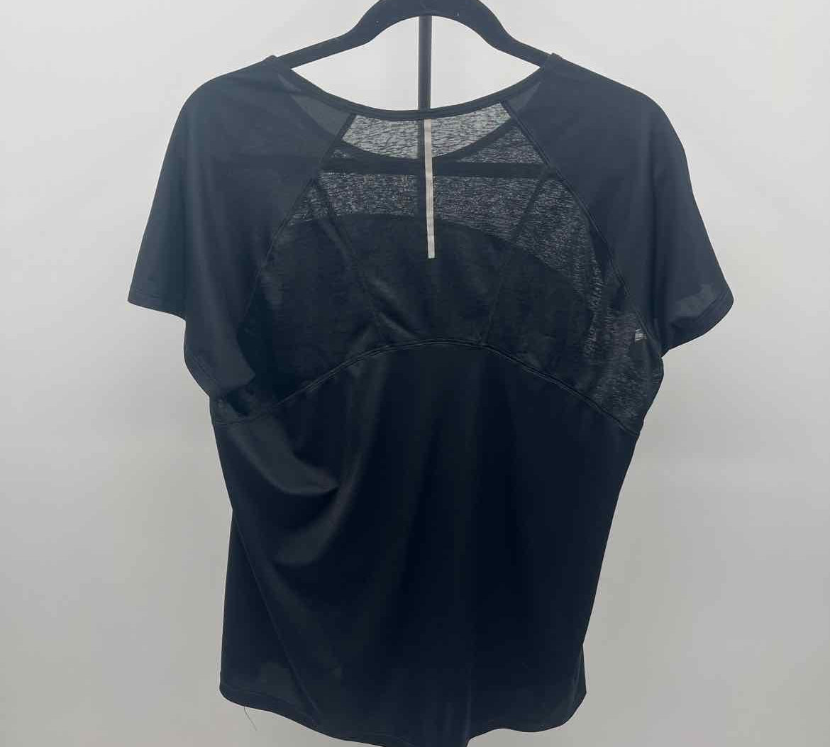 New Balance Women's Size L Black Solid Short Sleeve Shirt